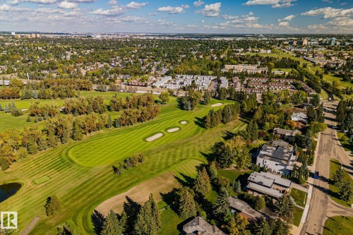 Expansive golf course frontage with manicured greens and sand traps - 12403 29A Avenue Nw, Edmonton, AB 