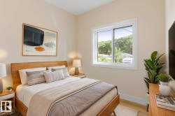Bedroom featuring a natural wood-finish bed frame and coordinating nightstands with integrated drawers - 