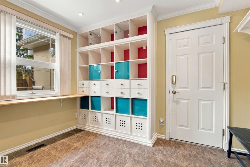 Built-in shelving unit with various compartments and pull-out drawers - 14103 60 Avenue Nw, Edmonton, AB 