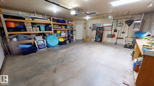 7727 77 Avenue Nw, Edmonton, AB - Indoor Photo Showing Garage