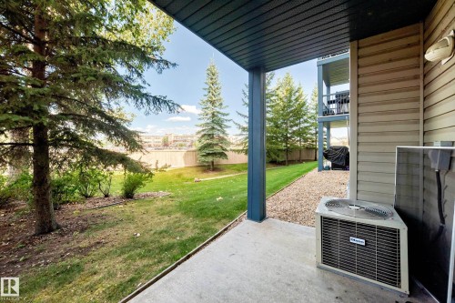 Covered patio with a concrete surface - #133 16311 95 St Nw, Edmonton, AB 