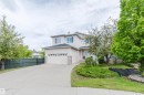 Front Exterior with Spacious Driveway and Double Attached Garage - 2236 Garnett Court Nw, Edmonton, AB 