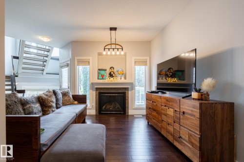 #10 1901 126 St Sw, Edmonton, AB - Indoor Photo Showing Living Room With Fireplace