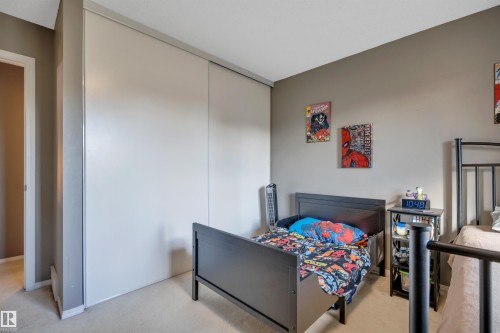 Wall-to-wall carpeting and neutral wall paint - #13 6608 158 Av Nw, Edmonton, AB 