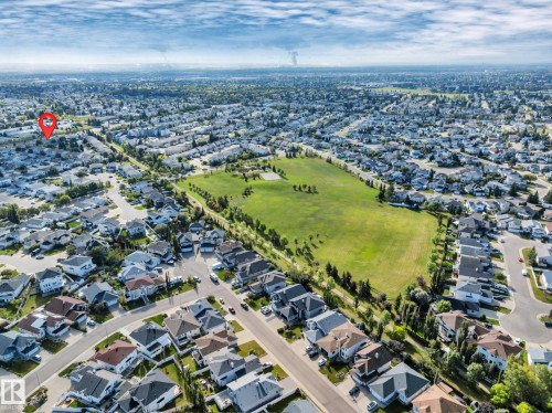 Residential neighborhood with abundant green spaces and tree-lined streets - #13 6608 158 Av Nw, Edmonton, AB 