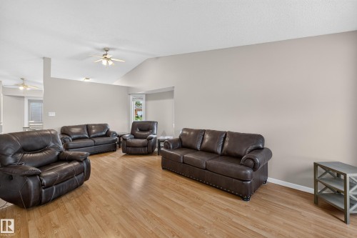 Vaulted ceiling, ceiling fan, wood-finish flooring, neutral wall tones, transom window - 365 Hollick-Kenyon Road Nw, Edmonton, AB 