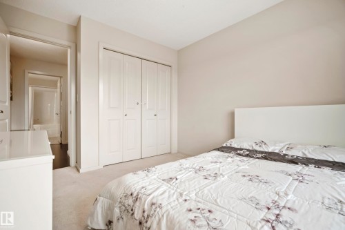 Neutral wall tones with soft carpeting - #419 5515 7 Av Sw, Edmonton, AB 