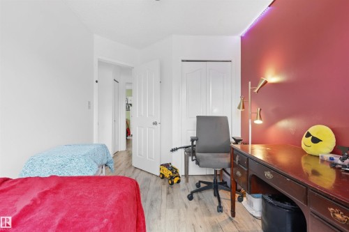 Wood-finish flooring throughout - 4824 13 Avenue Nw, Edmonton, AB 
