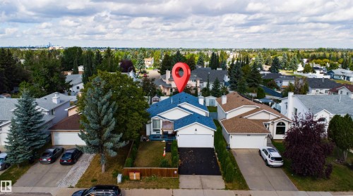 Attached single-car garage and a paved driveway - 4824 13 Avenue Nw, Edmonton, AB 