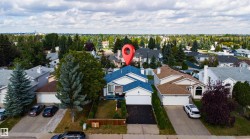 Attached single-car garage and a paved driveway - 