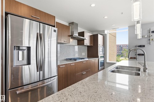#406 2504 109 St Nw, Edmonton, AB - Indoor Photo Showing Kitchen With Double Sink With Upgraded Kitchen