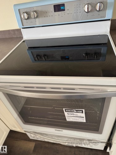 New electric range with a smooth cooktop surface and digital controls - #229 2305 35A Av Nw, Edmonton, AB 