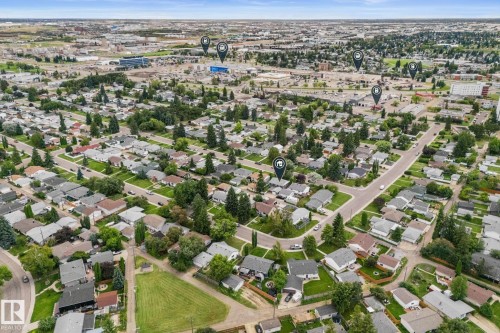 Residential property with mature trees and established landscaping - 6108 102 Avenue Nw, Edmonton, AB 