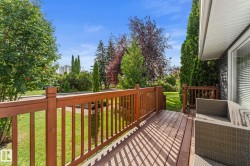 Wood-finish deck with matching railings - 