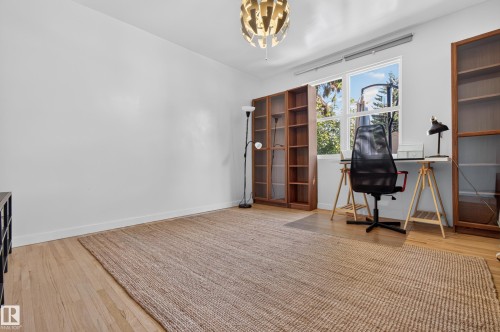 Hardwood flooring, recessed window, and white walls - 6807 112A Street Nw, Edmonton, AB 