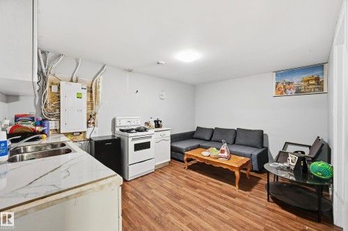 Wood-finish flooring throughout - 941 Ebbers Crescent Nw, Edmonton, AB 