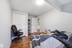 Wood-finish flooring with light-toned walls - 