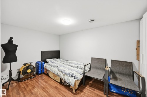 Recessed ceiling lighting, wood-finish flooring, and light-toned wall finishes - 941 Ebbers Crescent Nw, Edmonton, AB 