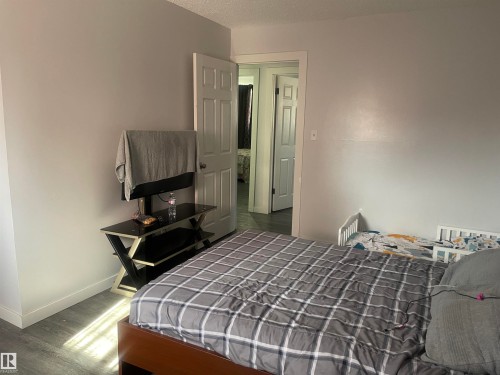Light gray painted walls and wood-finish flooring - 3221 132A Avenue Nw, Edmonton, AB 