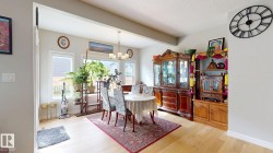 Light-toned wood-finish flooring complements the neutral wall color - 