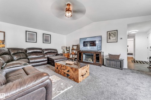 3400 Lakeview Point Northwest, Edmonton, AB - Indoor Photo Showing Living Room With Fireplace
