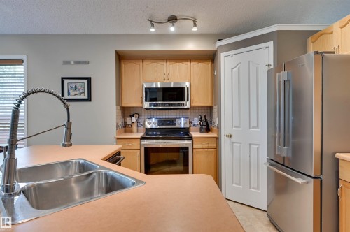 1524 Breckenridge Close Nw, Edmonton, AB - Indoor Photo Showing Kitchen With Double Sink