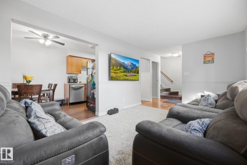 Open-concept living area with light-toned walls - #2 14120 80 St Nw, Edmonton, AB 