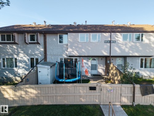 Stucco and siding exterior with a shingle roof - #2 14120 80 St Nw, Edmonton, AB 
