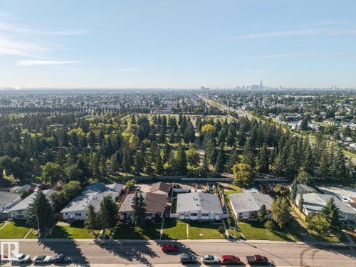 Expansive urban landscape with extensive tree coverage and a distant cityscape - #2 14120 80 St Nw, Edmonton, AB 