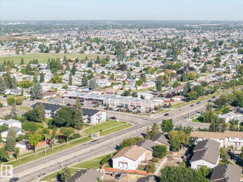 Expansive residential area featuring a mix of housing types, broad roadways, and extensive tree coverage - #2 14120 80 St Nw, Edmonton, AB 