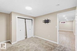 Neutral-toned walls complement plush carpeting - 