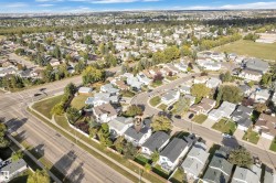 Residential area with established landscaping and paved roadways - 