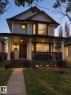 Two-story residence with a covered front porch and a bay window - 3830 22 Street Nw, Edmonton, AB 