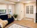 Recessed lighting illuminates wood-finish flooring - 3830 22 Street Nw, Edmonton, AB 