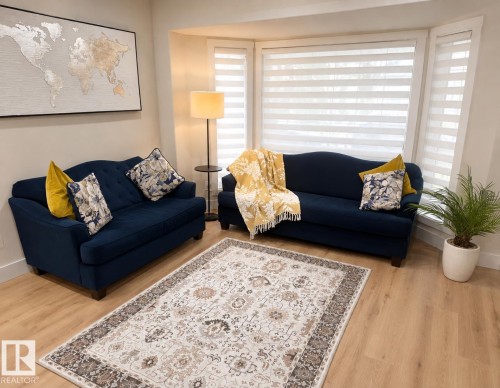 Bay window with horizontal blinds - 3830 22 Street Nw, Edmonton, AB 