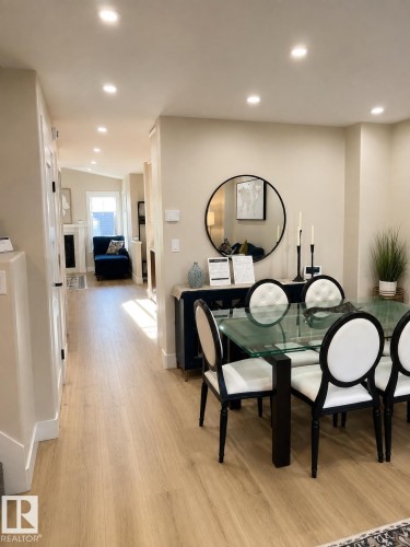 Recessed ceiling lighting, wood-finish flooring, and light-toned walls - 3830 22 Street Nw, Edmonton, AB 