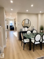 Recessed ceiling lighting, wood-finish flooring, and light-toned walls - 