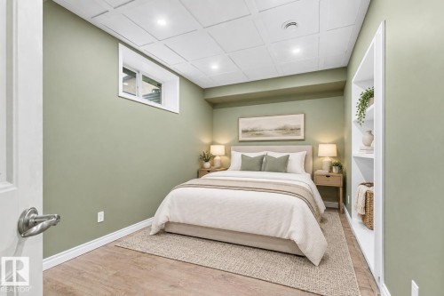Wood-finish flooring, recessed lighting, and a coffered ceiling - 703 107A Street Sw, Edmonton, AB 