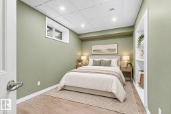 Wood-finish flooring, recessed lighting, and a coffered ceiling - 