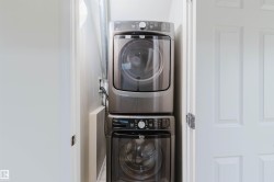 Stacked washer and dryer unit - 
