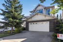 Brick and siding exterior with gabled roof lines - 1850 Rutherford Road Sw, Edmonton, AB 