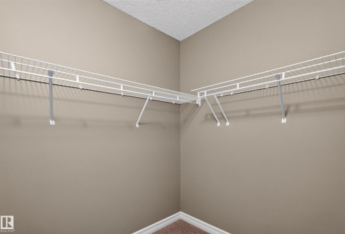 Integrated wire shelving system with L-shaped configuration - 1850 Rutherford Road Sw, Edmonton, AB 