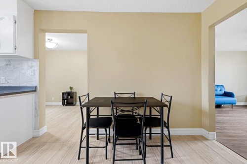 Countertop with tile backsplash - 11317 22 Avenue Nw, Edmonton, AB 