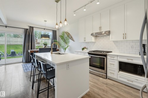 22434 99A Avenue Nw, Edmonton, AB - Indoor Photo Showing Kitchen With Upgraded Kitchen