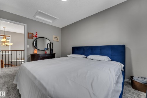 Recessed ceiling lighting, light gray wall tones, and carpet flooring - 3230 21A Avenue Nw, Edmonton, AB 