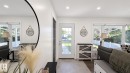 Recessed lighting illuminates the entryway and living area - 3508 106A Street Nw, Edmonton, AB 