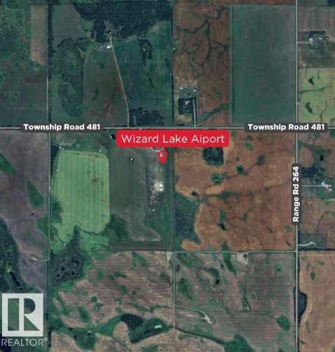 Satellite Map. Displaying the property's location relative to Township Road 481 and Range Road 264, with the Wizard Lake Airport identified - 26453 Twp Rd 481, Rural Leduc County, AB 