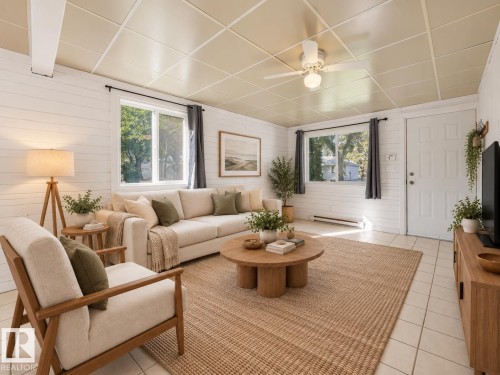 Wood-paneled walls, tile flooring, multiple windows, recessed ceiling, and a ceiling fan with integrated lighting - 11841 71 Street Nw, Edmonton, AB 