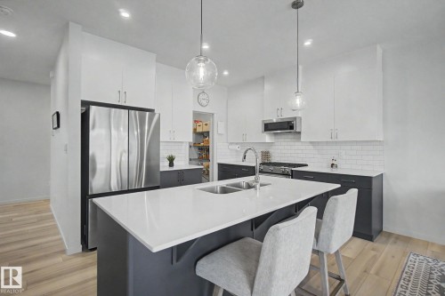 28 Rosewood Way, St. Albert, AB - Indoor Photo Showing Kitchen With Double Sink With Upgraded Kitchen