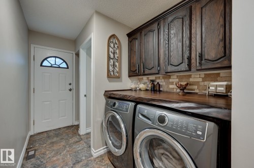 #100 22549 Twp Rd 510, Rural Leduc County, AB - Indoor Photo Showing Laundry Room